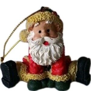 Christmas tree ornament Santa sitting